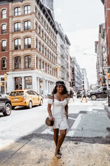 what to wear in new york city paris chic style off the shoulder white dress